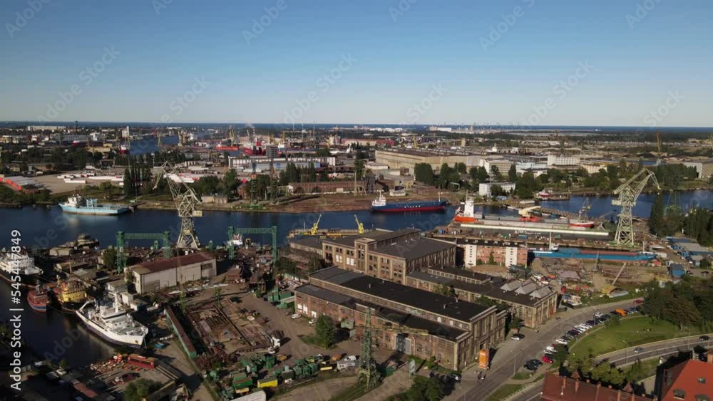 View from the drone on the port canal and the shipyard on Gdansk on a sunny ,summer day. View from the drone on the port canal and the shipyard on Gdansk on a sunny ,summer day.