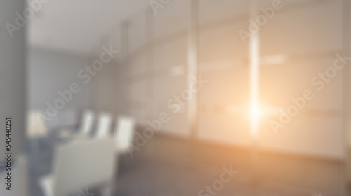 Modern office building interior. 3D rendering.. Sunset.. Abstract blur phototography.