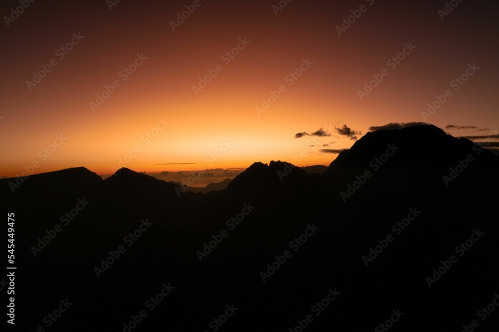 Beautiful shot of mountains silhouettes during the sunset