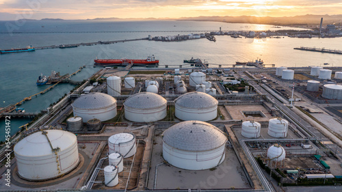Aerial view oil terminal industrial facility storage tank oil and petrochemical product for transport to further storage facility, Storage tank petroleum petrochemical refinery product at oil terminal