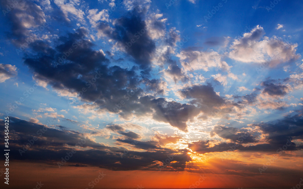 
Sunset/sunrise with clouds, light rays and other atmospheric effects