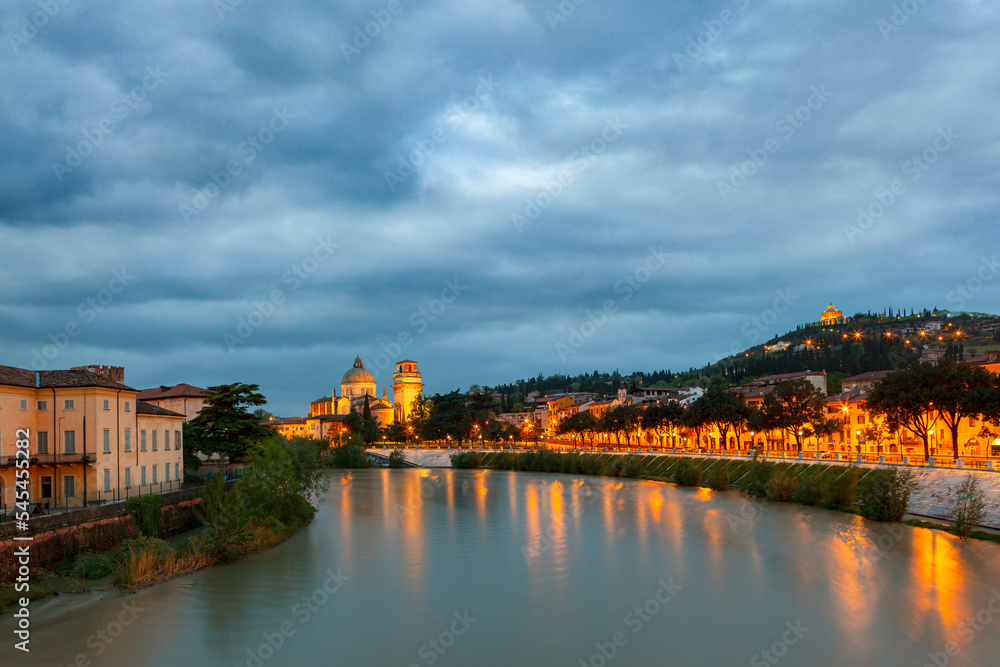 Adige river in Verona, Sunrise cityscape of Verona. Architecture and sights of Verona. Italy.