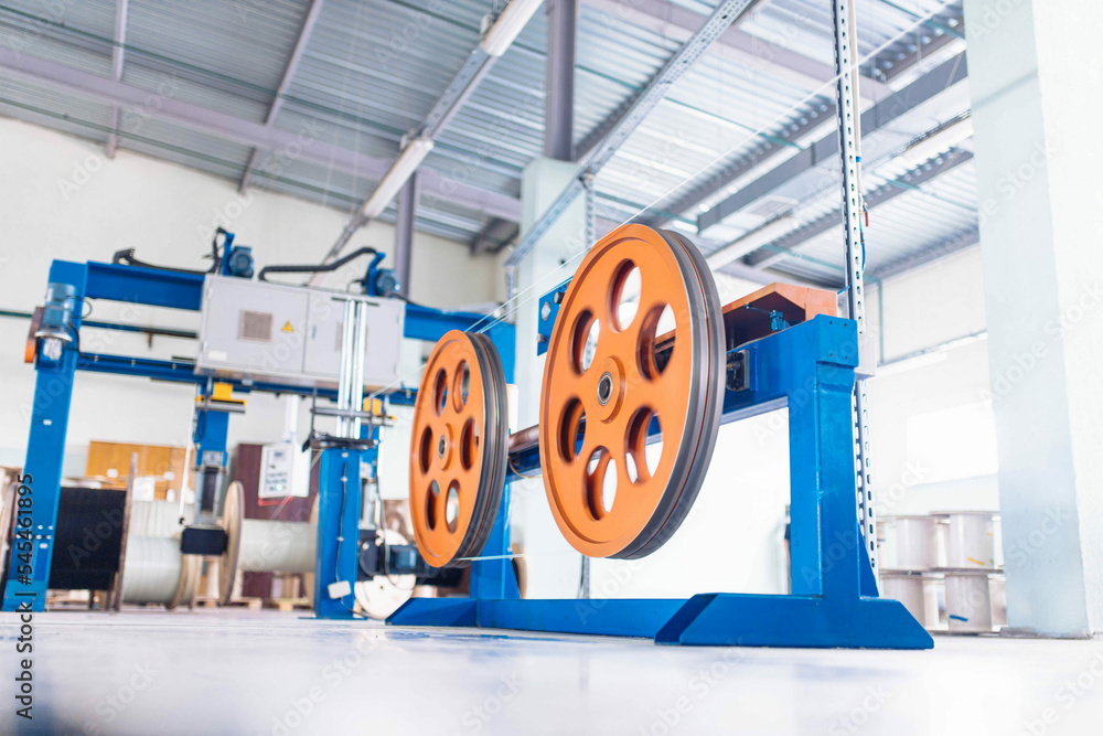 production of glass fiber fiber optic cable in the factory, Internet telecommunications wires in coils.
