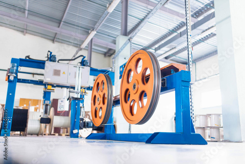 Obraz na płótnie production of glass fiber fiber optic cable in the factory, Internet telecommunications wires in coils. w salonie