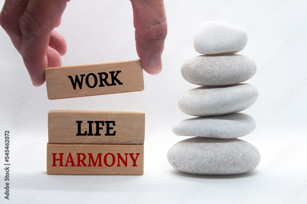 Work life harmony text on wooden blocks with zen stones background ...
