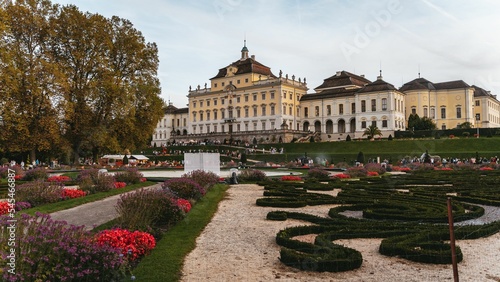 Bog palace with colorful flowers in the garden in Deutschland