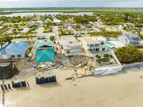 Beach homes collapse aftermath Hurricane Nicole Daytona Florida photo