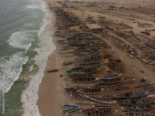 Aerial view of a bunch of wooden boats on the port of Nouakchott, Mauritania