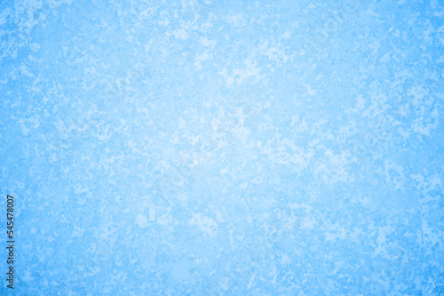 The blue texture of ice in the glow of a pattern of white frost. Background concept