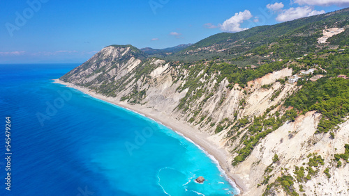 Fototapeta Naklejka Na Ścianę i Meble -  Aerial drone photo of famous paradise beach of Egremni white steep rocky hills overlooking deep turquoise Ionian sea, Lefkada island