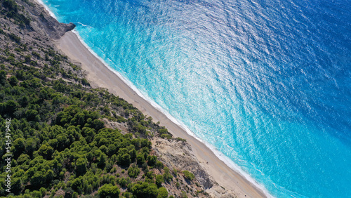 Aerial drone photo of famous paradise beach of Egremni white steep rocky hills overlooking deep turquoise Ionian sea, Lefkada island photo