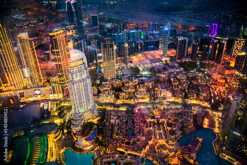 Wallpaper Mural  Dubai city at night, view with lit up skyscrapers and roads. UAE, 2022 Torontodigital.ca