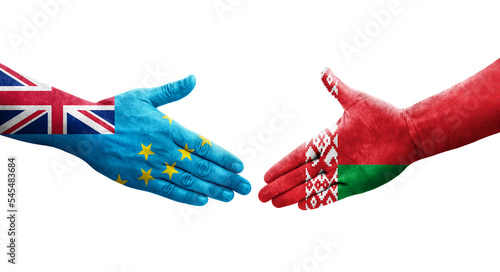 Handshake between Tuvalu and Belarus flags painted on hands  isolated transparent image.