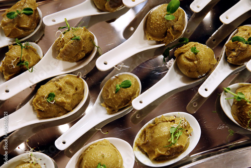 Set of ice cream balls or scoops or sorbet isolated on white spoons. Banquet event .