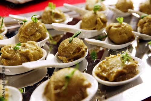 Set of ice cream balls or scoops or sorbet isolated on white spoons. Banquet event .