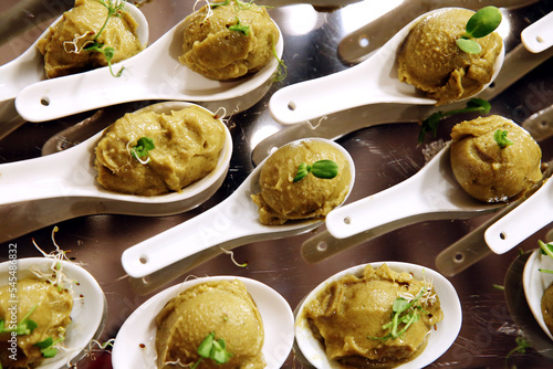 Set of ice cream balls or scoops or sorbet isolated on white spoons. Banquet event .