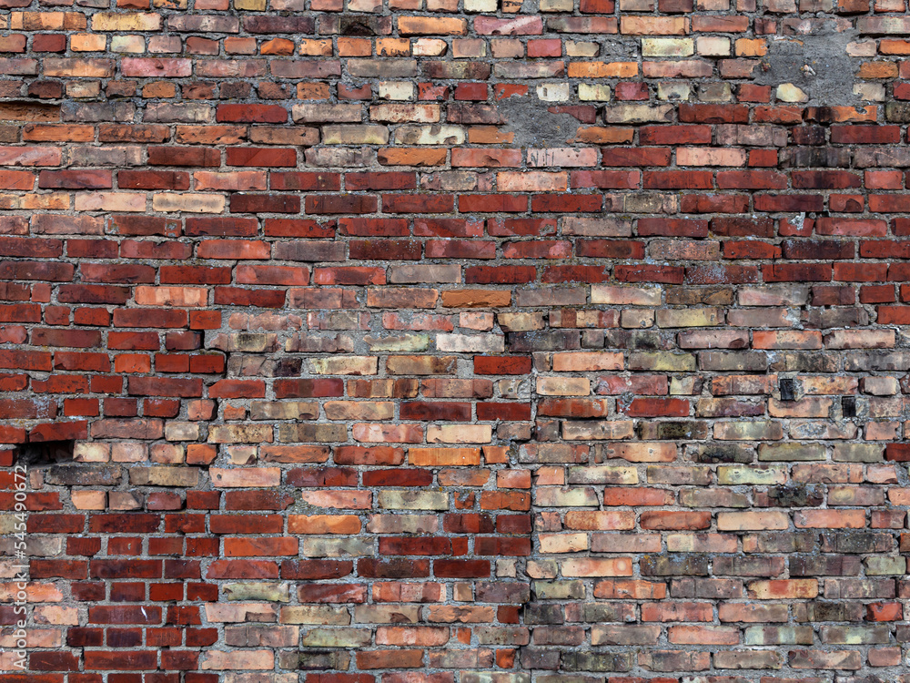 Grunge wall texture from red bricks