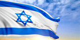 National flag of Israel on background of a sunset or sunrise. National Holidays background
