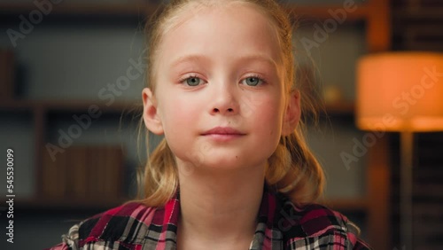 Pretty cute girl child teen toddler daughter caucasian european teenager schoolgirl youth adorable face of young happy learner posing at home beautiful angelic baby blonde kid beauty childhood concept photo