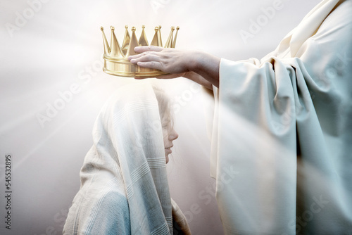 Hands placing a crown on a woman s head