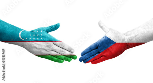 Handshake between Uzbekistan and Czechia flags painted on hands, isolated transparent image.