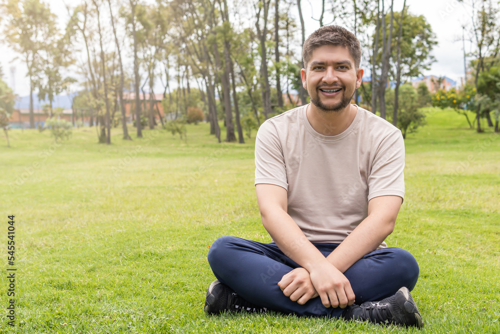 man sitting in the park resting man sitting in the park resting