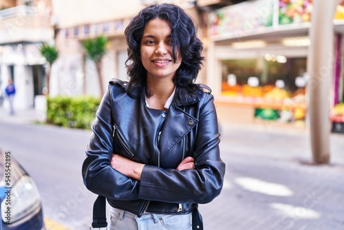 Young latin woman at street