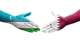 Handshake between Uzbekistan and Qatar flags painted on hands, isolated transparent image.