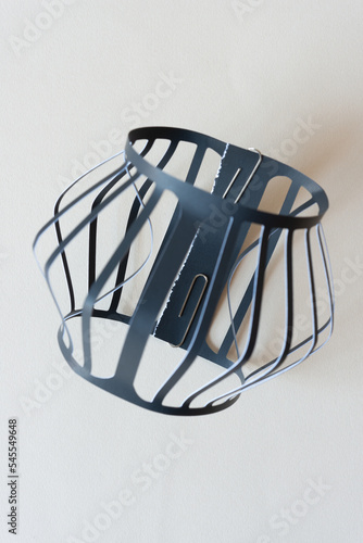 abstract 3d paper object with bent spokes