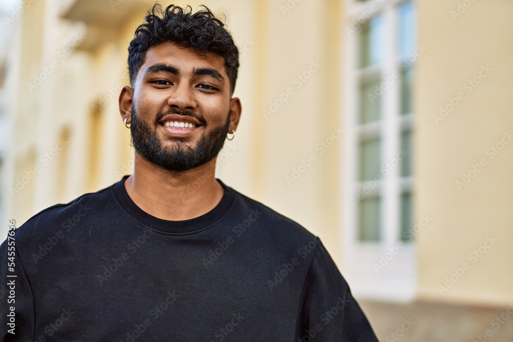 Young arab man smiling confident at street Young arab man smiling confident at street