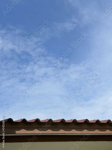 roof of a house with a blue sky