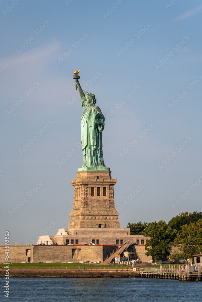 Side view of the Statue of Liberty on the island