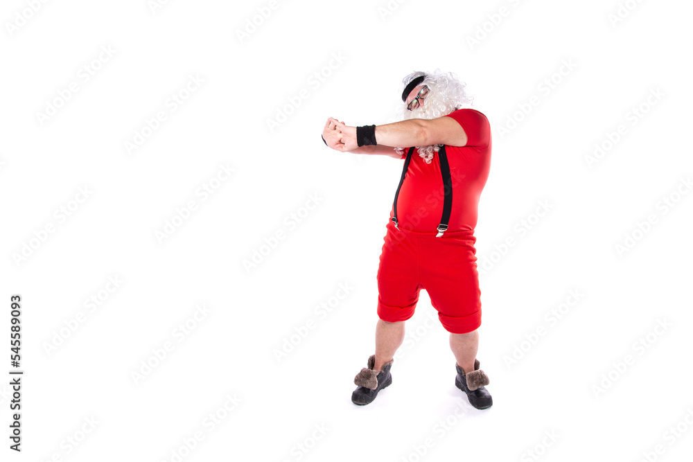 Funny Santa Claus goes in for sports. Man posing on a white background. Funny Santa Claus goes in for sports. Man posing on a white background.