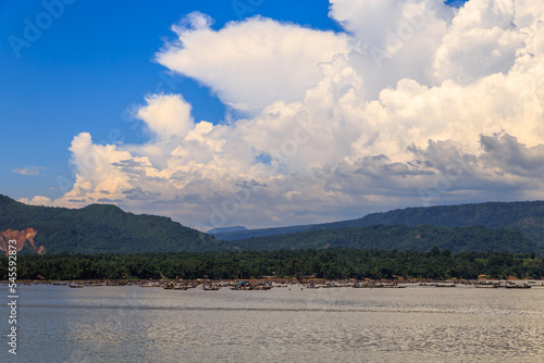 Life at river near mountain