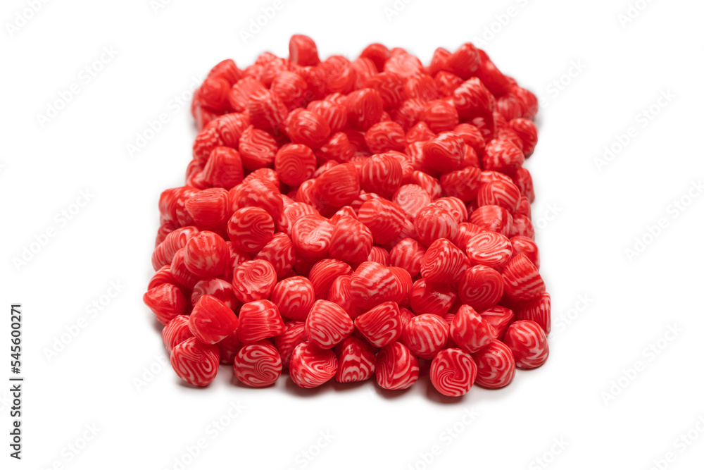 Red round tasty gummy candies islolated on a white background. Red round tasty gummy candies islolated on a white background.
