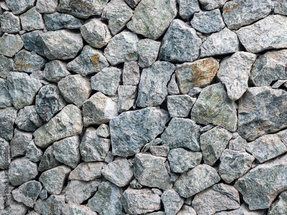 Wall stone texture background. Granite wall. Wall stone texture background. Granite wall.