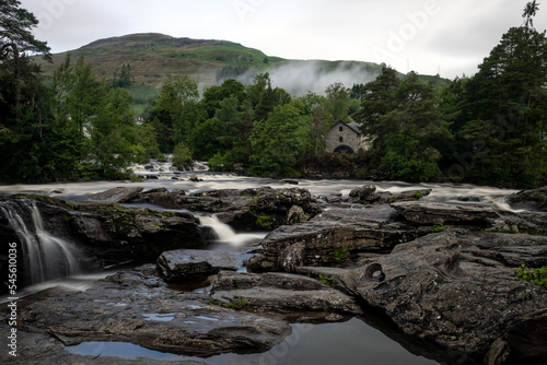 Waterfalls on the Killin River flowing through the town of Killin in central Scotland highlands.