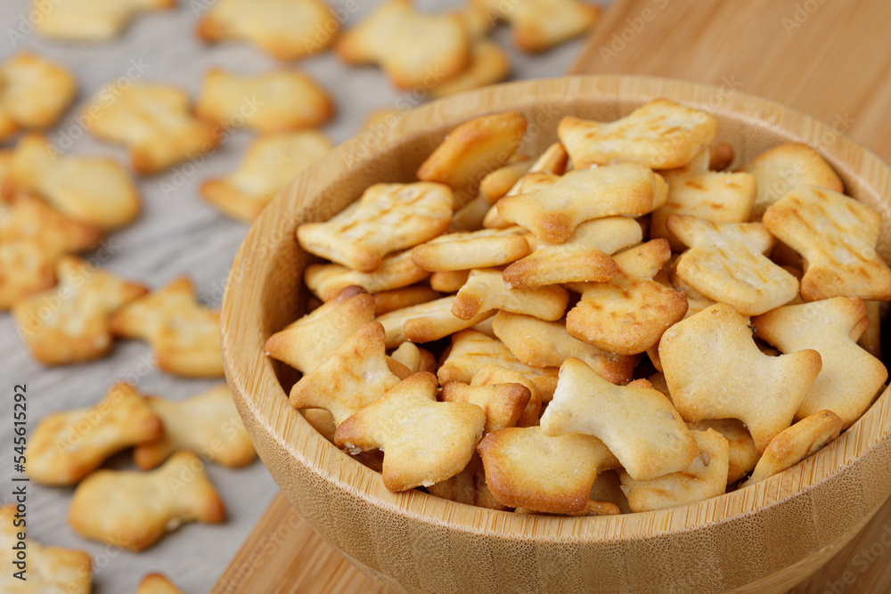 Wooden bowl of delicious goldfish crackers Wooden bowl of delicious goldfish crackers