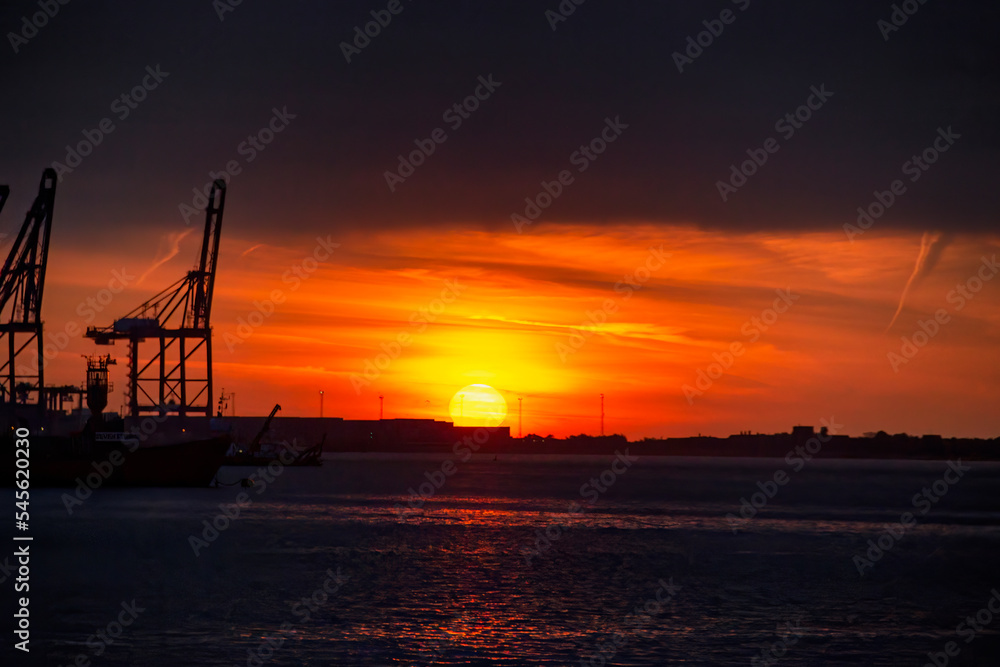 Sunrise over the Port of Felixstowe in Suffolk, UK