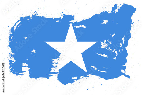Foto Somalia flag with painted grunge brush stroke effect on white background