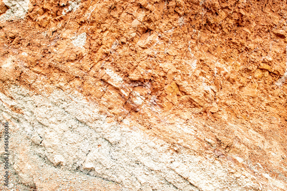 Texture of layers of natural clay red and white Texture of layers of natural clay red and white