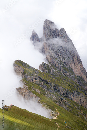 Wonderful and famous dolomite mountains: View to Odles group on a cloudy day. Specacular view from seceda peak. picturesue landscape in south tyrol, italy, garda valley. puez odles nature park.	 photo