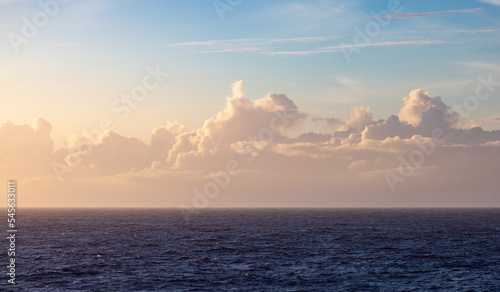 Dramatic Colorful Sunset Sky over North Atlantic Ocean. Cloudscape Nature Background.