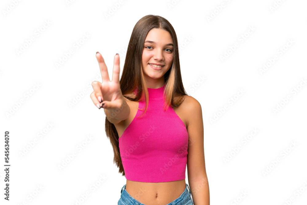 Teenager caucasian girl over isolated background smiling and showing victory sign Teenager caucasian girl over isolated background smiling and showing victory sign
