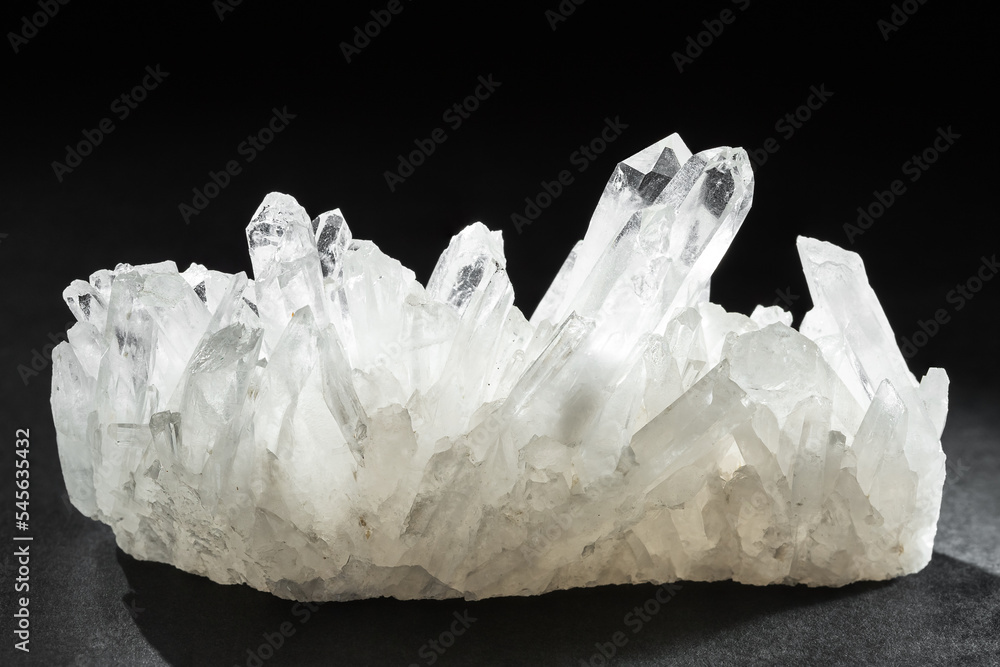 Pure Quartz Crystal Cluster on Black Background Pure Quartz Crystal Cluster on Black Background