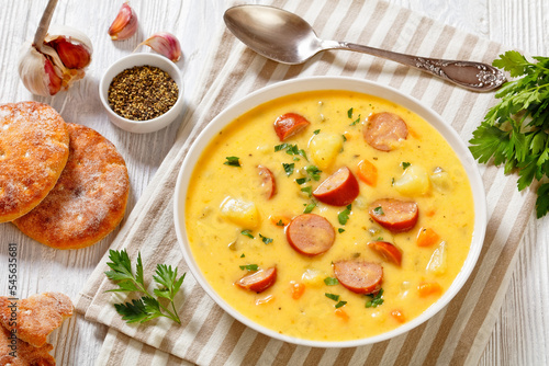 German potato soup with sausages in bowl