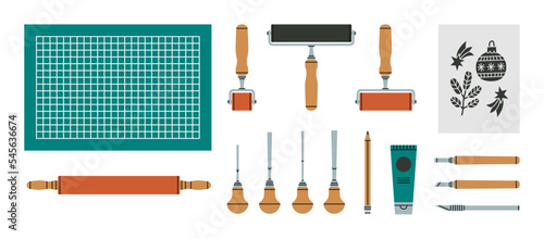 Set with linocutting equipment. Arts and crafts concept. Paint roller, woodcutter and other tools for linocut. Hand draw vector illustration isolated on white background. photo