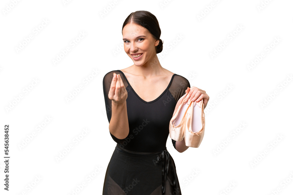 Young caucasian woman practicing ballet over isolated background making money gesture Young caucasian woman practicing ballet over isolated background making money gesture