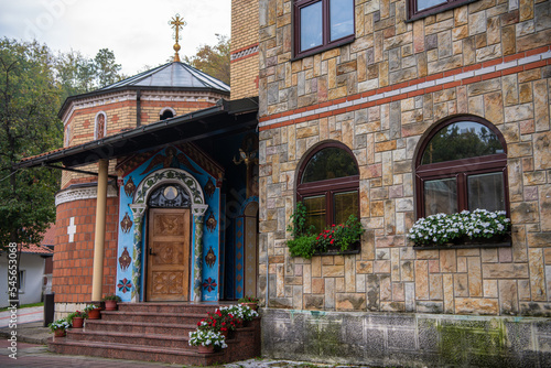 Orthodox Monastery of St.Archangel (Tresije) on mountain Kosmaj, Exterior with frescoes. Sopot, Serbia 10.09.2022 photo