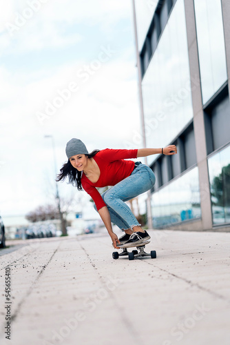 Skater Girl Practicing in the Street